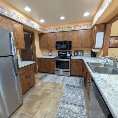 Skogland Condo #11 – Patio with lots of natural light and cozy furnishings!