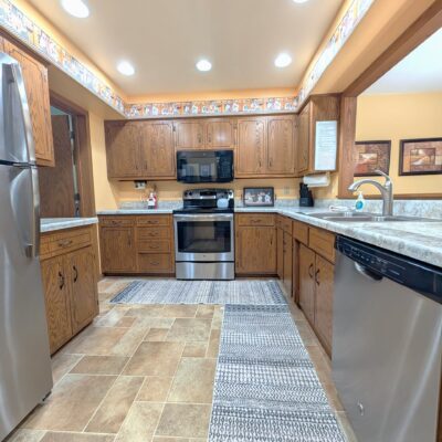 Skogland Condo #11 – Patio with lots of natural light and cozy furnishings!