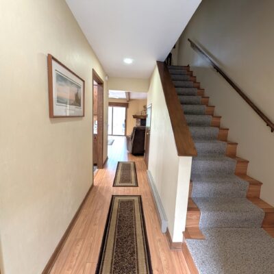 Skogland Condo #11 – Patio with lots of natural light and cozy furnishings!